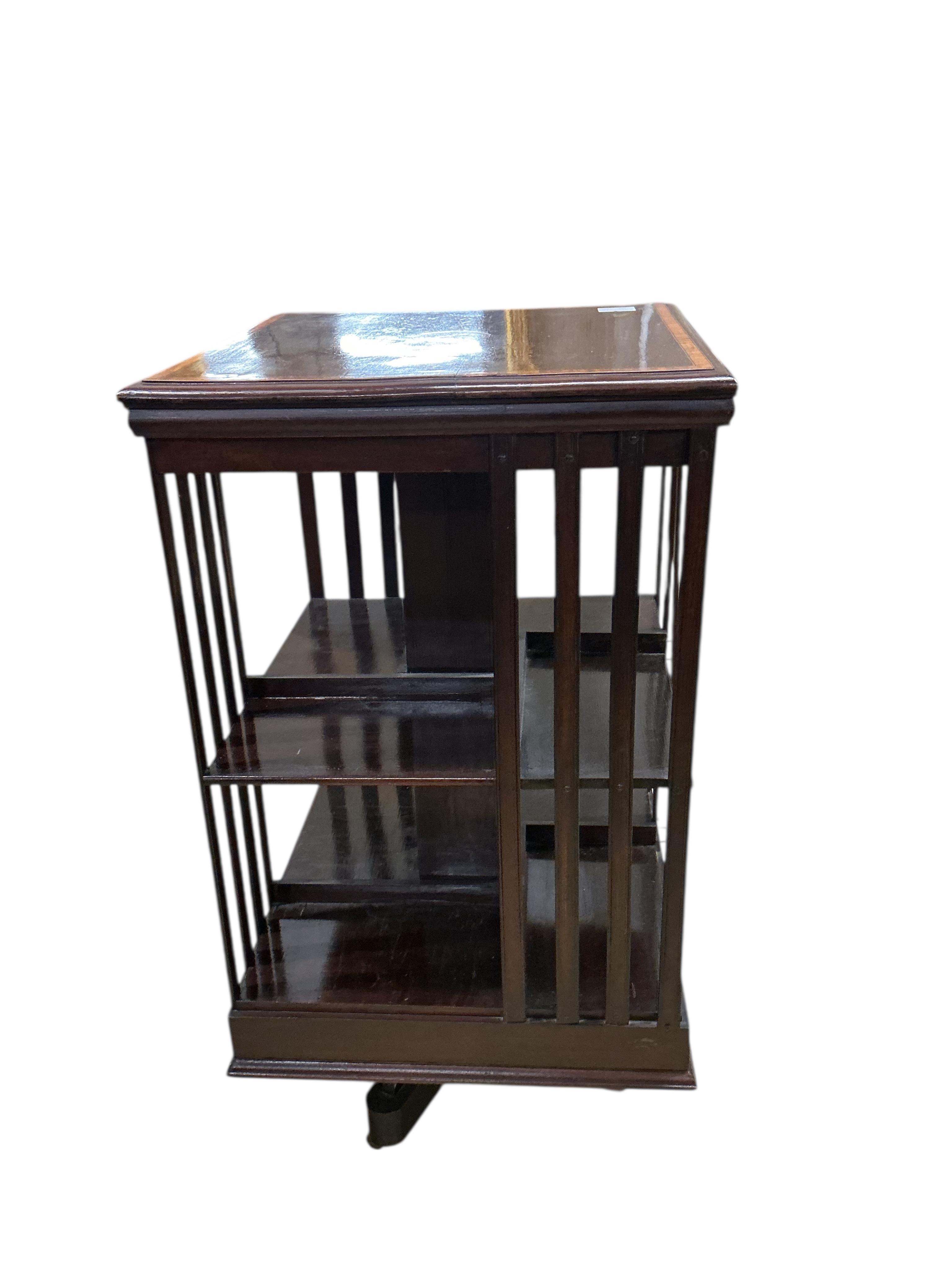 An Edwardian satinwood banded inlaid mahogany revolving bookcase, width 48cm, depth 48cm, height 87cm